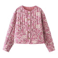 Veste courte matelassée à motif floral rose