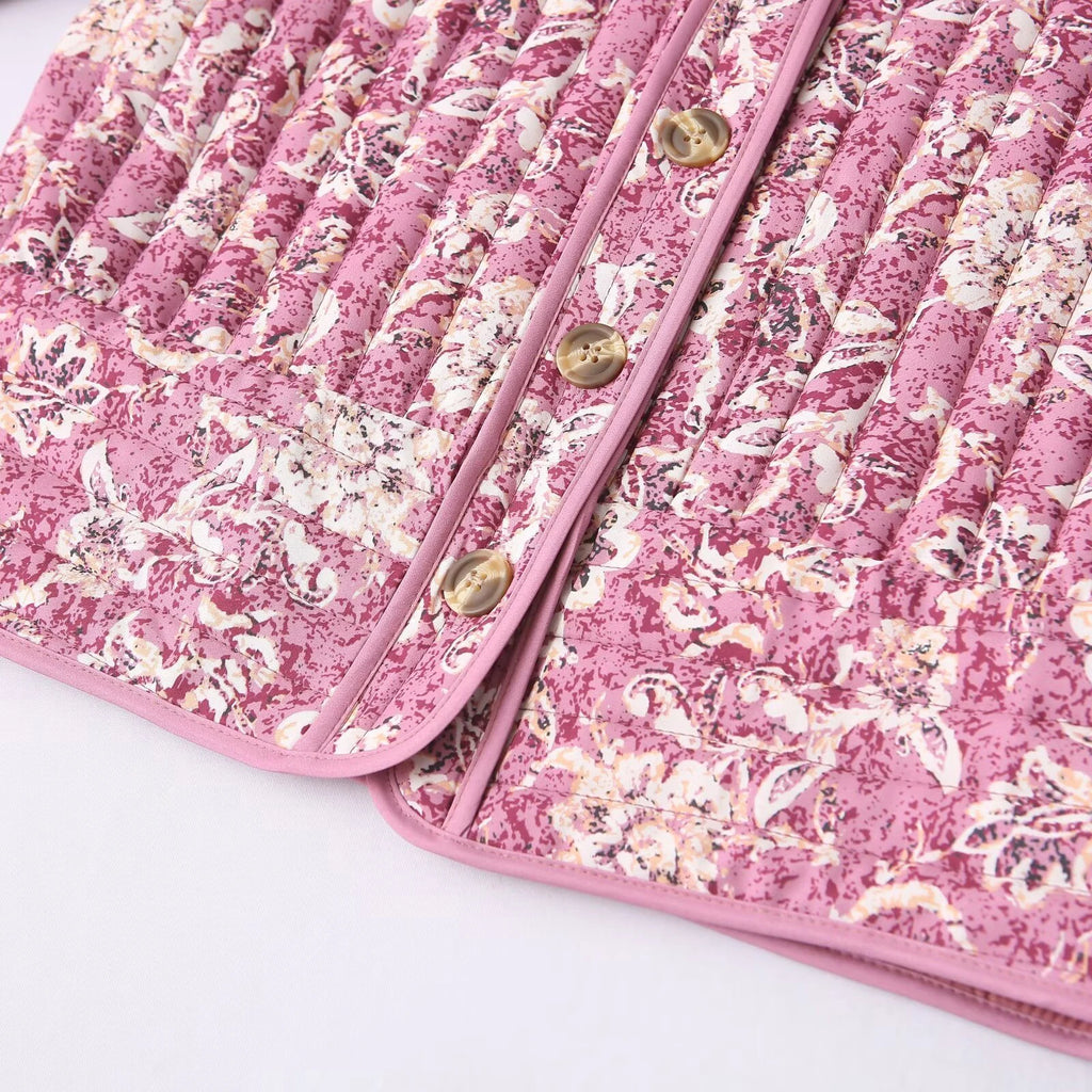 Veste courte matelassée à motif floral rose