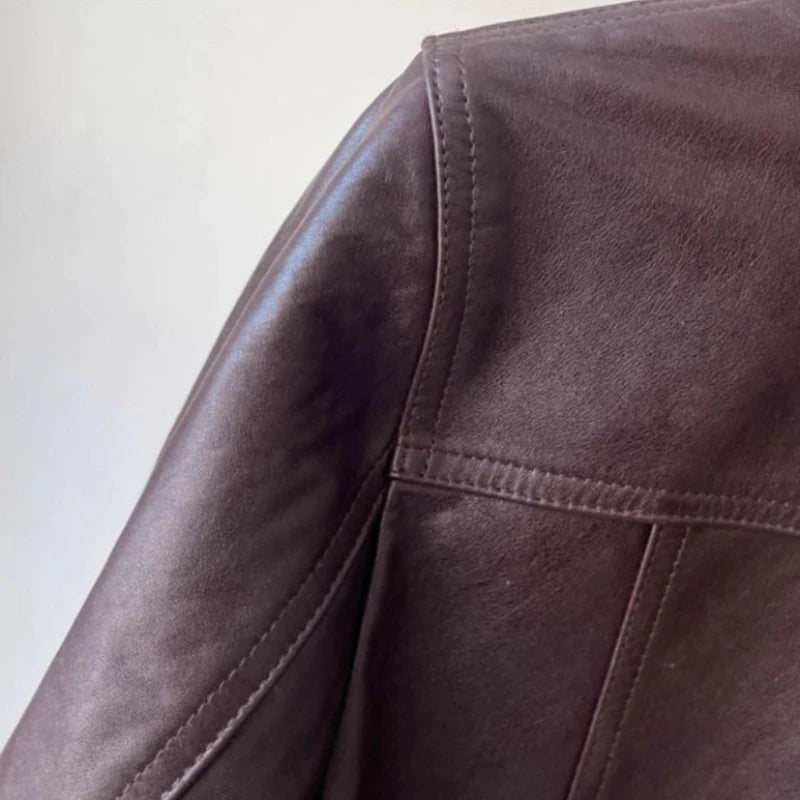 Veste courte en cuir marron à boutons