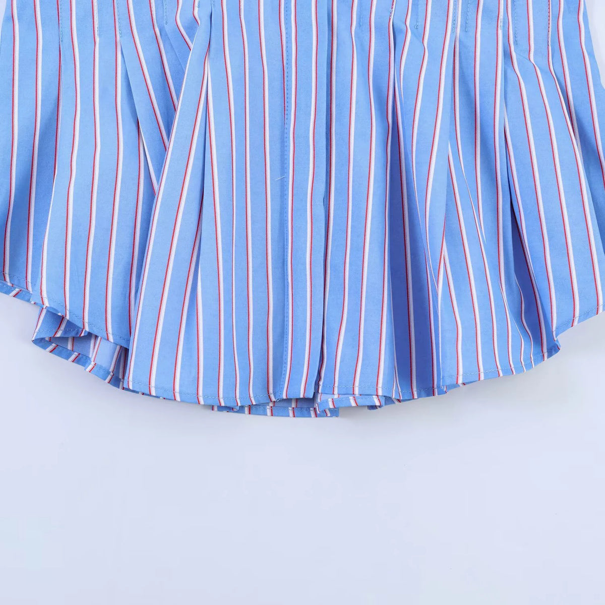 Chemise cintrée à plis bleu rayé