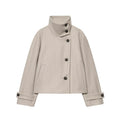 Manteau court beige à col montant