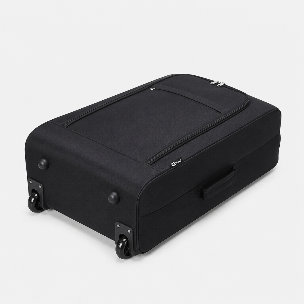 Valise cabine souple noire, sol studio gris