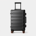 Valise cabine en aluminium noir, face studio gris