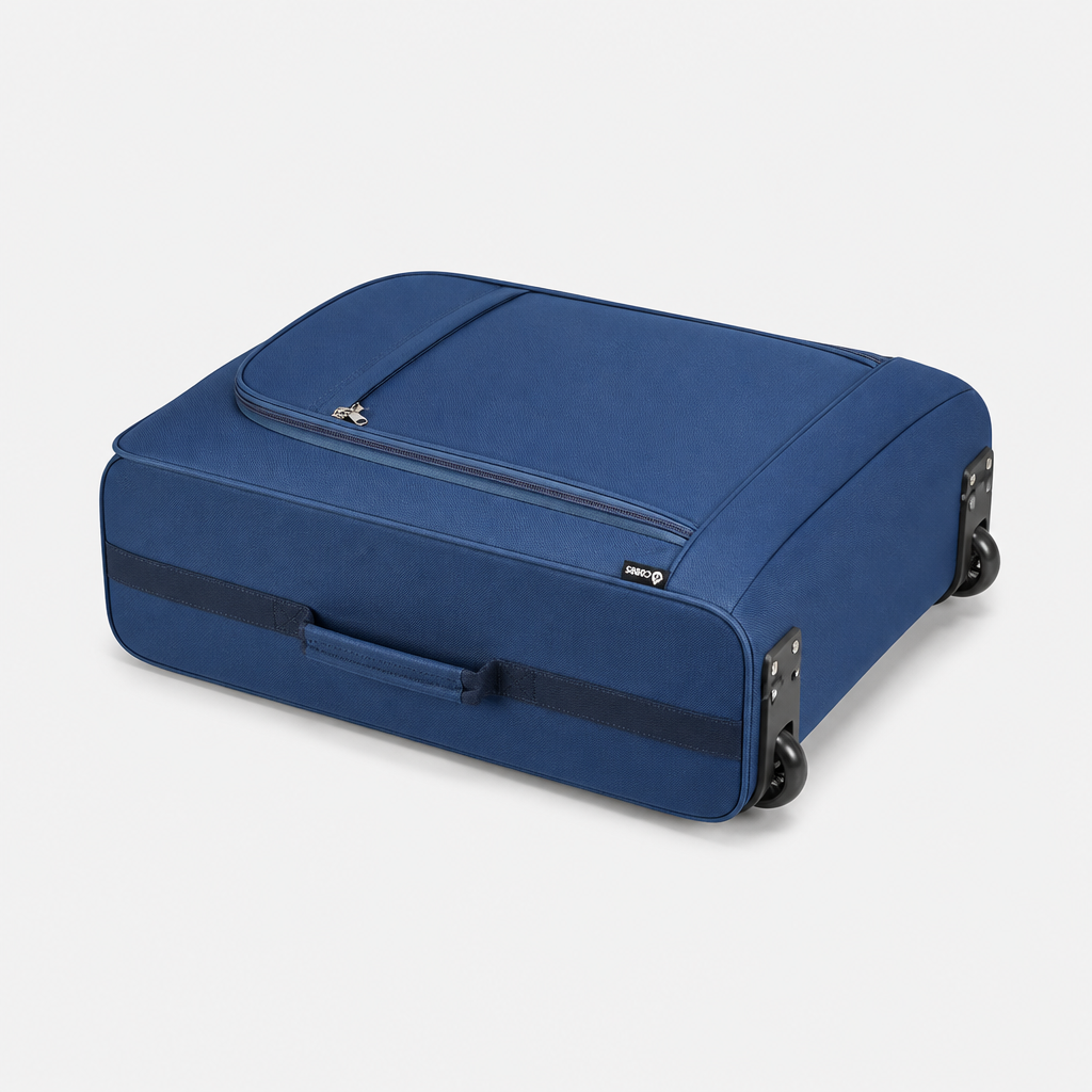 Valise cabine souple bleue, sol studio gris