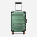 Valise cabine en aluminium vert foncé, face studio gris