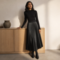 AMII Minimalist Retro Fashion Women Skirts 2024 Winter New A-line Pleated PU Simple Office Lady Leather Skirt Female 12323021, éditorial