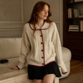 2026 Autumn Winter Retro Love Button Knitted Sweater Women Outer Wear Lazy Style Doll Collar Twist Cardigan Loose Sweater Tops, éditorial