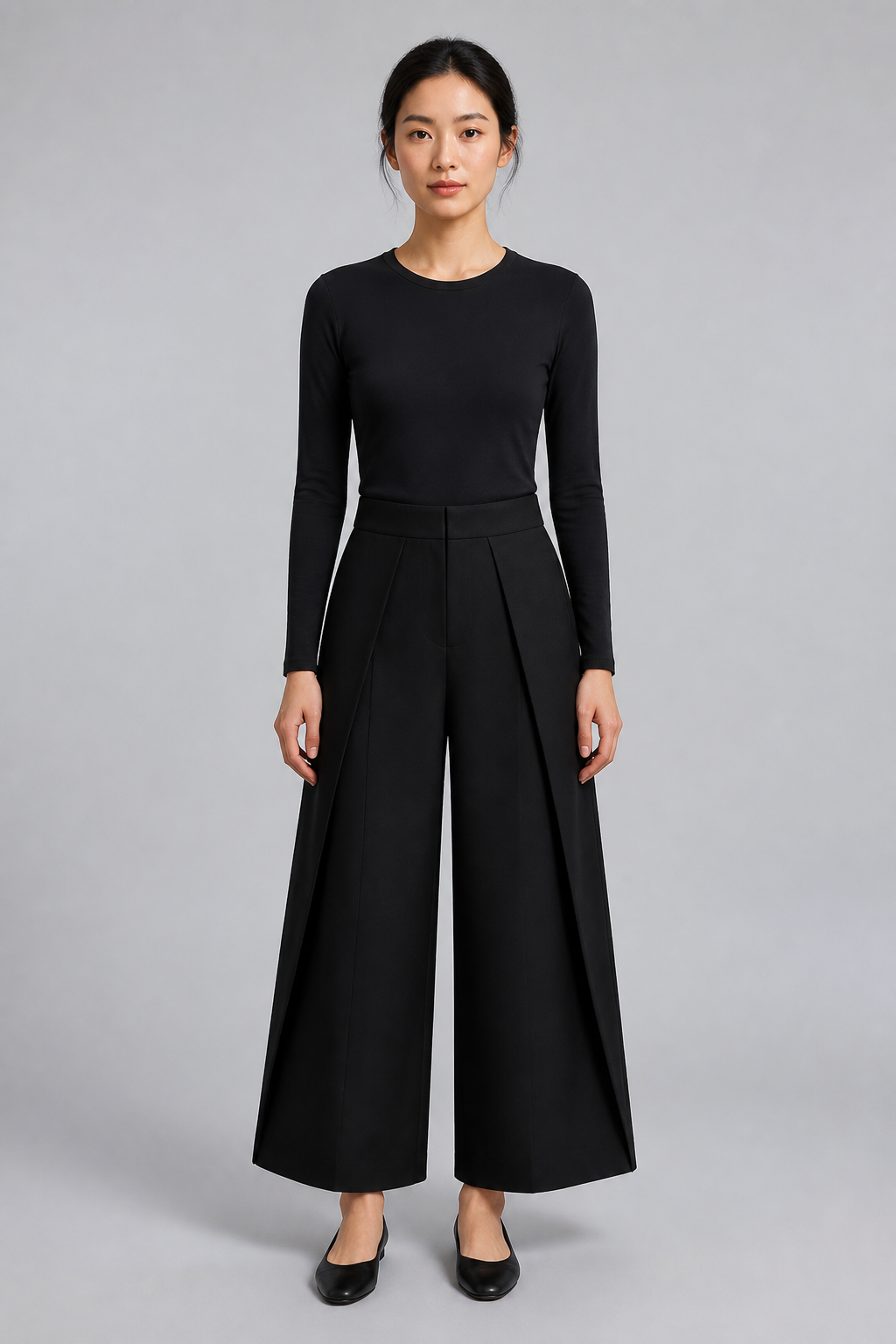 Pantalon large taille haute à plis noir, studio face
